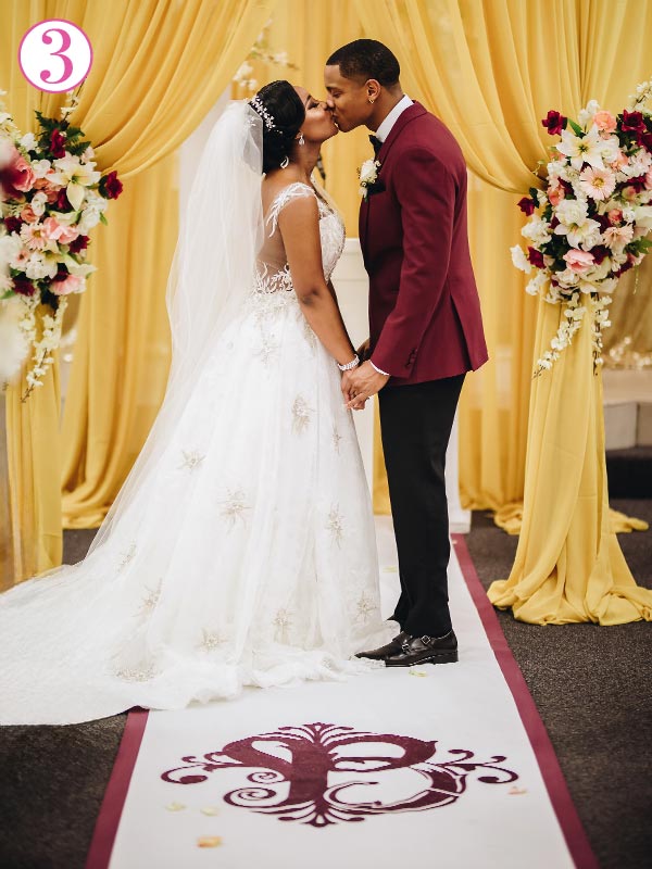 Install wedding aisle runner to the back of the room so it continues past the couple.