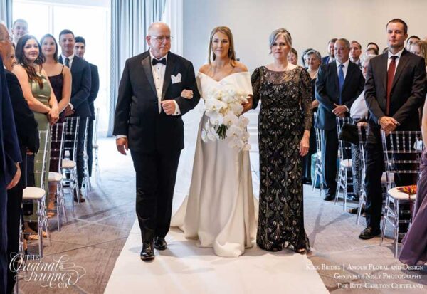 Kirk Brides. Amour Floral and Design. Genevieve Nisly Photography. The Ritz-Carlton Cleveland. Indoor ballroom wedding. Simple. Carpet installation.